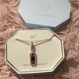 Chic Gold Necklace with Black Details